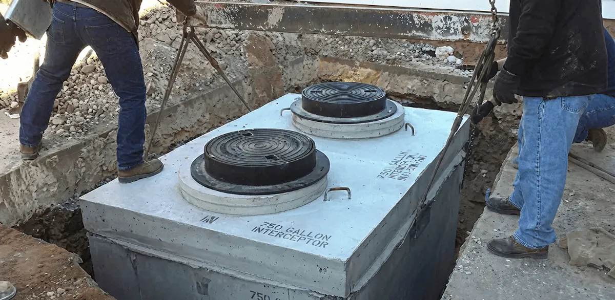 Grease trap installation for a commercial property drainage system in Columbus, OH